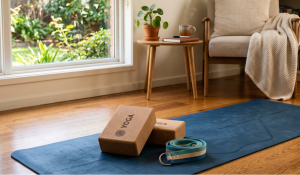 yoga strap on yoga mat with yoga blocks